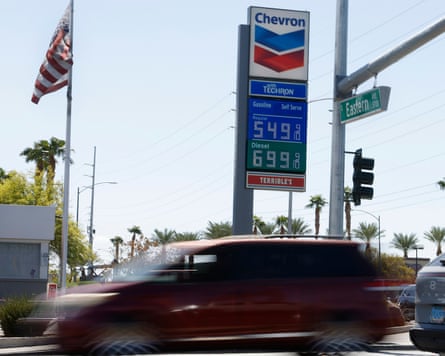 A Chevron gas station displays its prices last month on Eastern Avenue in Las Vegas as vehicles pass