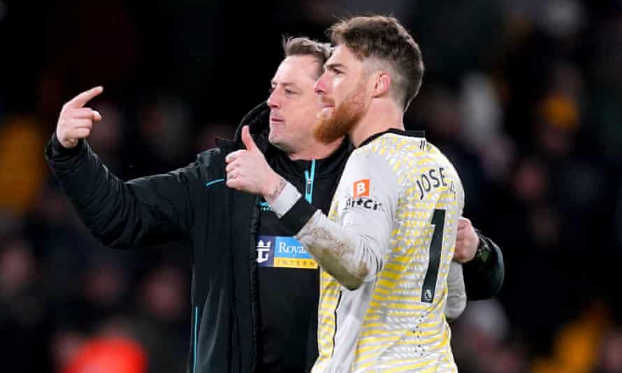 Tony Roberts and the Wolves goalkeeper José Sá enjoy February’s win at home to Leicester.