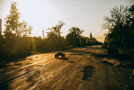 A ground robot travels along a road.