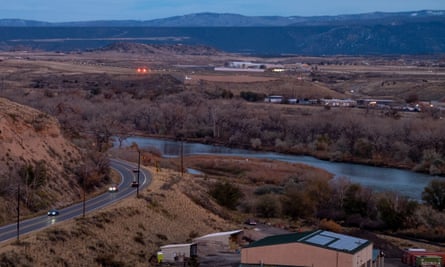 Lights twinkle from the Rifle-Garfield County Airport Center as dusk falls in Rifle, Colorado, on Wednesday, November 1, 2023.