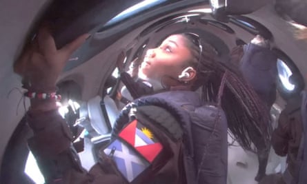 Anastasia Mayers looks out of the windows while in space.