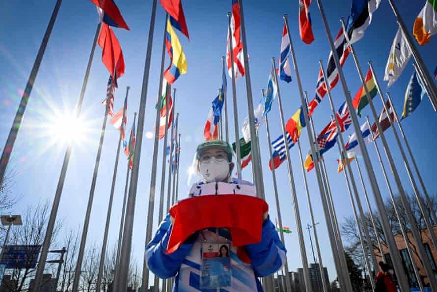 A member of staff prepares for the arrival of Thomas Bach before the Olympic Truce Mural ceremony in Beijing.