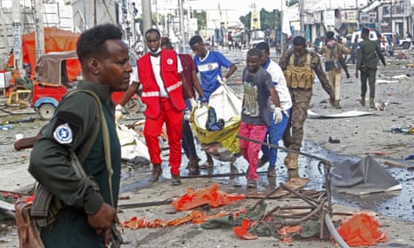Rescuers removing a person from the scene of the attack in the capital of Somalia.