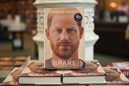 Stack of the autobiography of the Duke of Sussex, Spear, in a library.