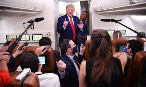 Trump speaks to the press on Air Force One on his way back to Washington from Wisconsin. The death toll from Covid-19 in the US is approaching 200,000.