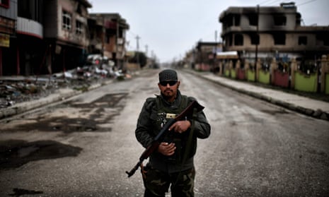 A member of the Nineveh Plain Protection Units, a Christian militia charged with protecting the town of Qaraqosh, Iraq.