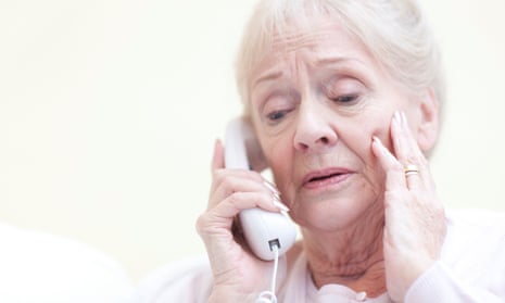 Senior woman talking on the telephone and looking worried