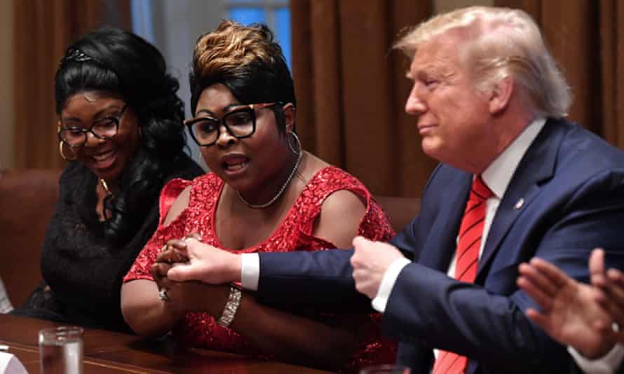 Lynnette Hardaway, Rochelle Richardson and Donald Trump in the Cabinet Room of the White House in February.