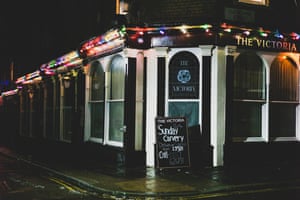 A sign advertising a Sunday carvery take away is displayed outside a pub on a deserted street on January 02, 2021 in Saltburn By The Sea, England.