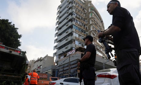 Police at the site of the explosion in Tel Aviv on Friday