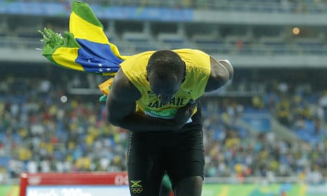 Usain Bolt accepts the crowds applause. 