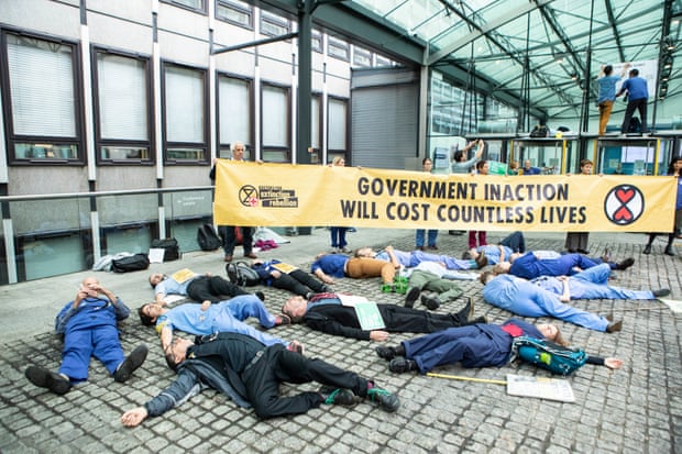 Doctors stage a die-in outside the Department for Business, Energy and Industrial Strategy in central London.