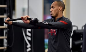 Fabinho uses the Arm Strengthener Machine!