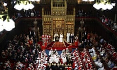 King Charles sits alongside Queen Camilla as he reads the King's Speech in the House of Lords chamber, during the State Opening of Parliament