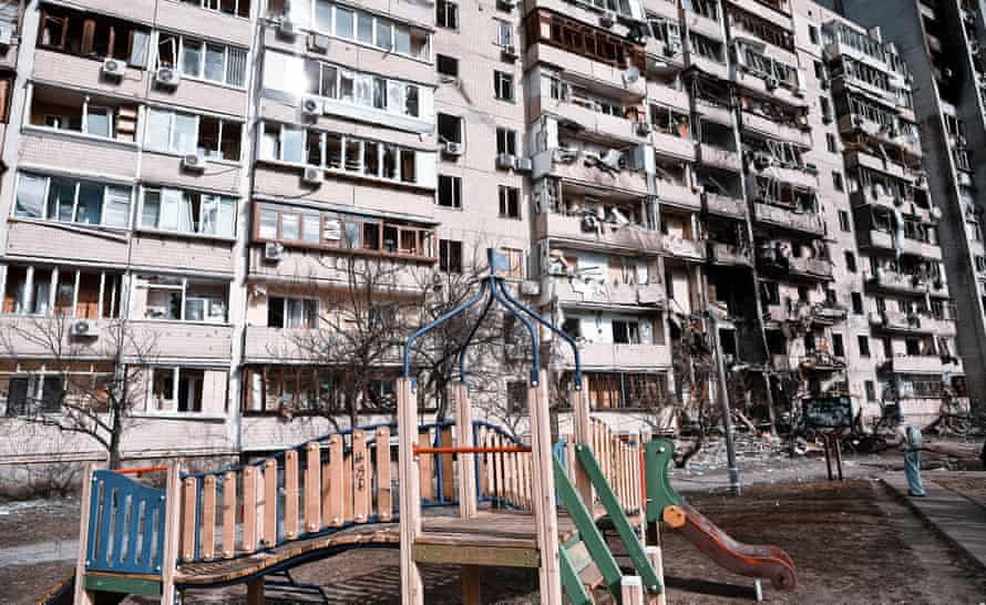 A heavily damaged apartment complex in Kyiv