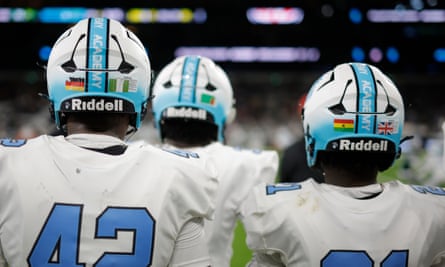 NFL Academy players helmets showing off the flags of their heritage during the match NFL Academy against De La Salle Spartans.