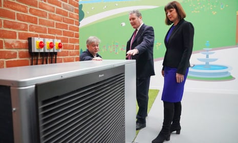 Labour party leader Sir Keir Starmer and Rachel Reeves, shadow chancellor of the Exchequer, are shown a heat pump demonstrator by Octopus Energy CEO and founder Greg Jackson.