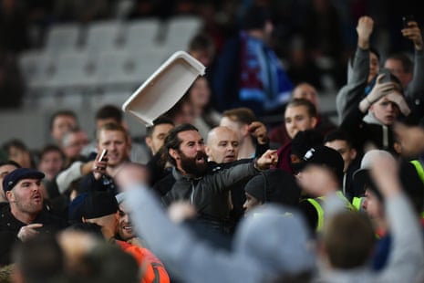 West Ham United and Chelsea fans clash.