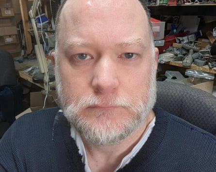 Head and shoulders of Andrew Foster in workshop