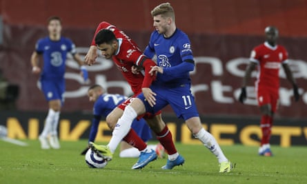 Chelsea’s Timo Werner battles with Liverpool’s Ozan Kabak.