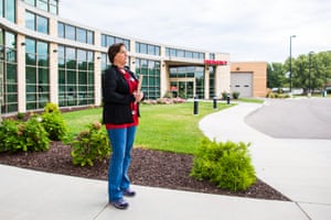 Having just finished her rounds, Dr Nancy Zidek stands at the entrance of the newly-opened community hospital in Onaga, Kansas.