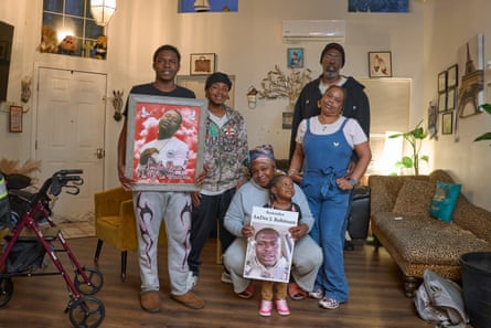 A portrait of the Robinson family at home.