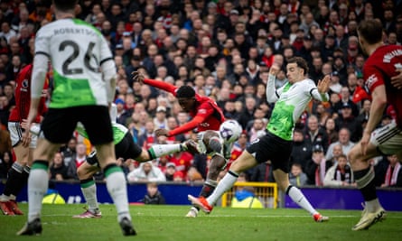 Kobbie Mainoo curls in his brilliant goal against Liverpool during the 2-2 draw at Old Trafford in early April.