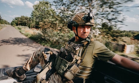 A Ukrainian soldier heads to the frontline in New York, Donbass, Ukraine.