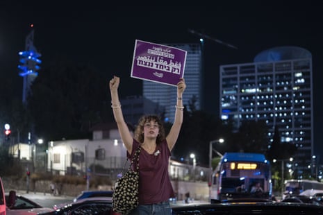 Left-wing protesters gather to demand a joint government of Palestinians and Jewish Israeli’s, blocking roads in Tel Aviv on Wednesday evening.