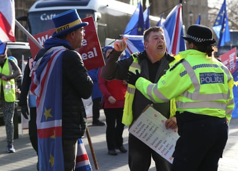 A leave supporter is spoken to by a police officer as he argues with a remain supporter outside Parliament in London, as police in the area have been “briefed to intervene appropriately” if the law is broken after Tory MP Anna Soubry accused them of ignoring abuse hurled at politicians and journalists.