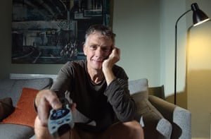 Sam Wollaston watching TV in his living room.