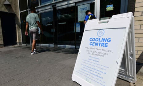 A person enters the Hillcrest Community Centre where they can cool off, during the extreme hot weather in Vancouver on 30 June.