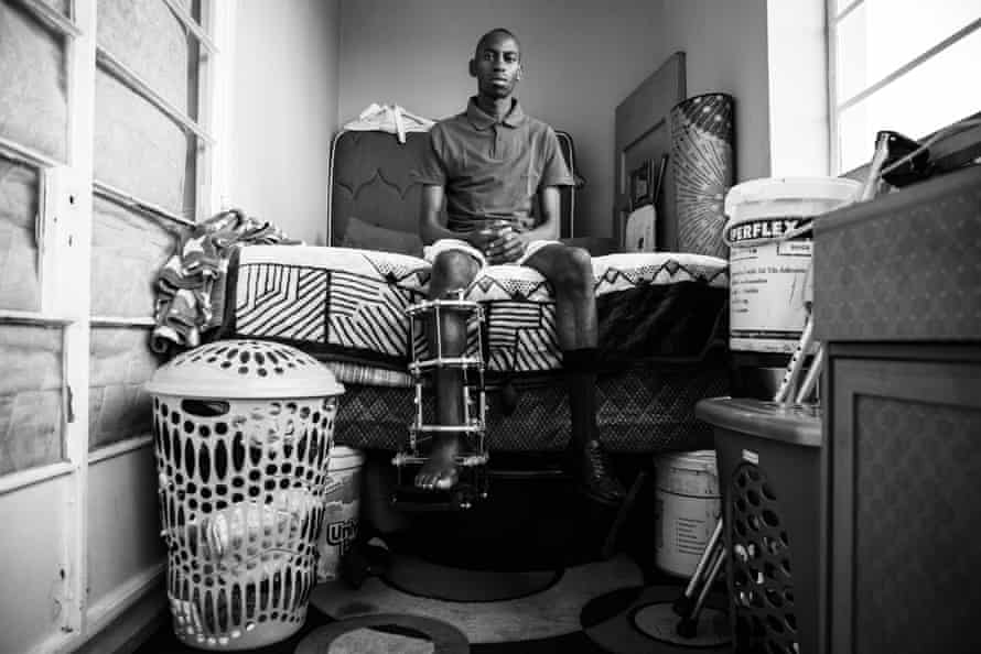 Ghost riders: the invisible lives of Johannesburg food couriers – photo essay | South Africa 22 Sikhumbuzo Gwebu was badly injured in a crash