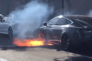 A Tesla car on fire in California in this image captured by actor Mary McCormack.