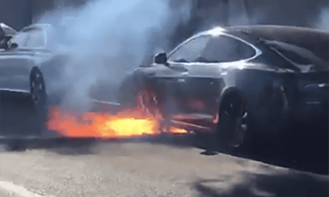 A Tesla car on fire in California in this image captured by actor Mary McCormack.