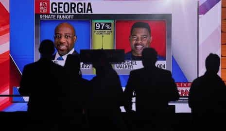 Supporters of Raphael Warnock attend a runoff night party in Atlanta, Georgia.