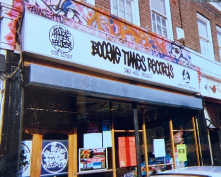 Boogie Times Records with graffiti across the wall above the shopfront