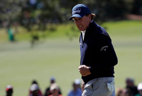 Phil Mickelson remains in contention, here making a birdie on the seventh,