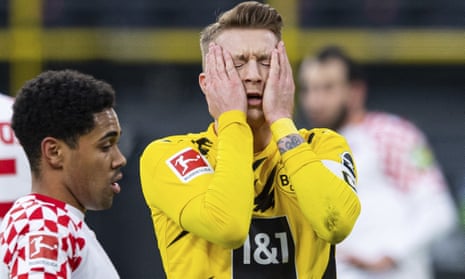 Marco Reus despairs after his missed penalty in Dortmund’s 1-1 home draw against Mainz