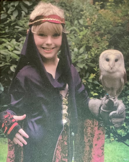 Eight-year-old Courtney wearing red and black fingerless gloves from Claire’s.