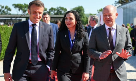 The Kosovan president, Vjosa Osmani (centre), meets Emmanuel Macron (left) and Olaf Scholz in Chișinău, Moldova, on Thursday