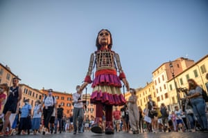 Rome, Italy Amal crosses Piazza Navona