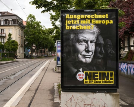 A billboard featuring Donald Trump’s face urges people to vote against the Swiss People’s party referendum