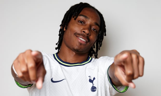 Djed Spence is unveiled by Spurs.
