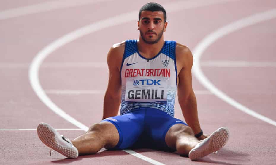 Adam Gemili slumps on the track after the race.