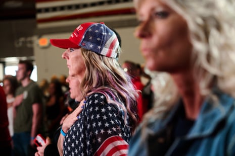 Trump rally attendees recite the Pledge of Allegiance at a campaign event with former US President Donald Trump in Wisconsin 1 May.