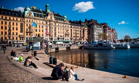 Swedes are still free to gather in public places such as the waterfront in Stockholm.