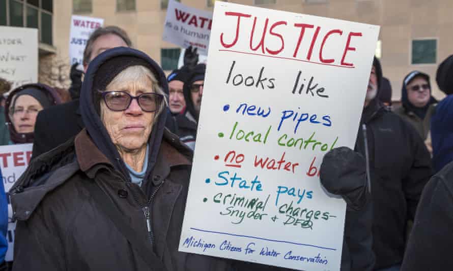 A January 2016 protest in Lansing, Michigan over the Flint water crisis.