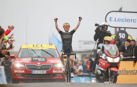 Simon Yates rises over the top to win the stage.