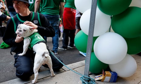No, I’m not sure why dogs are dressed in Celtics jerseys outside TD Garden in Boston, but it’s an excuse to show a picture of a dog in tonight’s commentary.